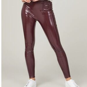 Spanx faux latex leggings. 
Brand new! Burgundy color 
Size x-large